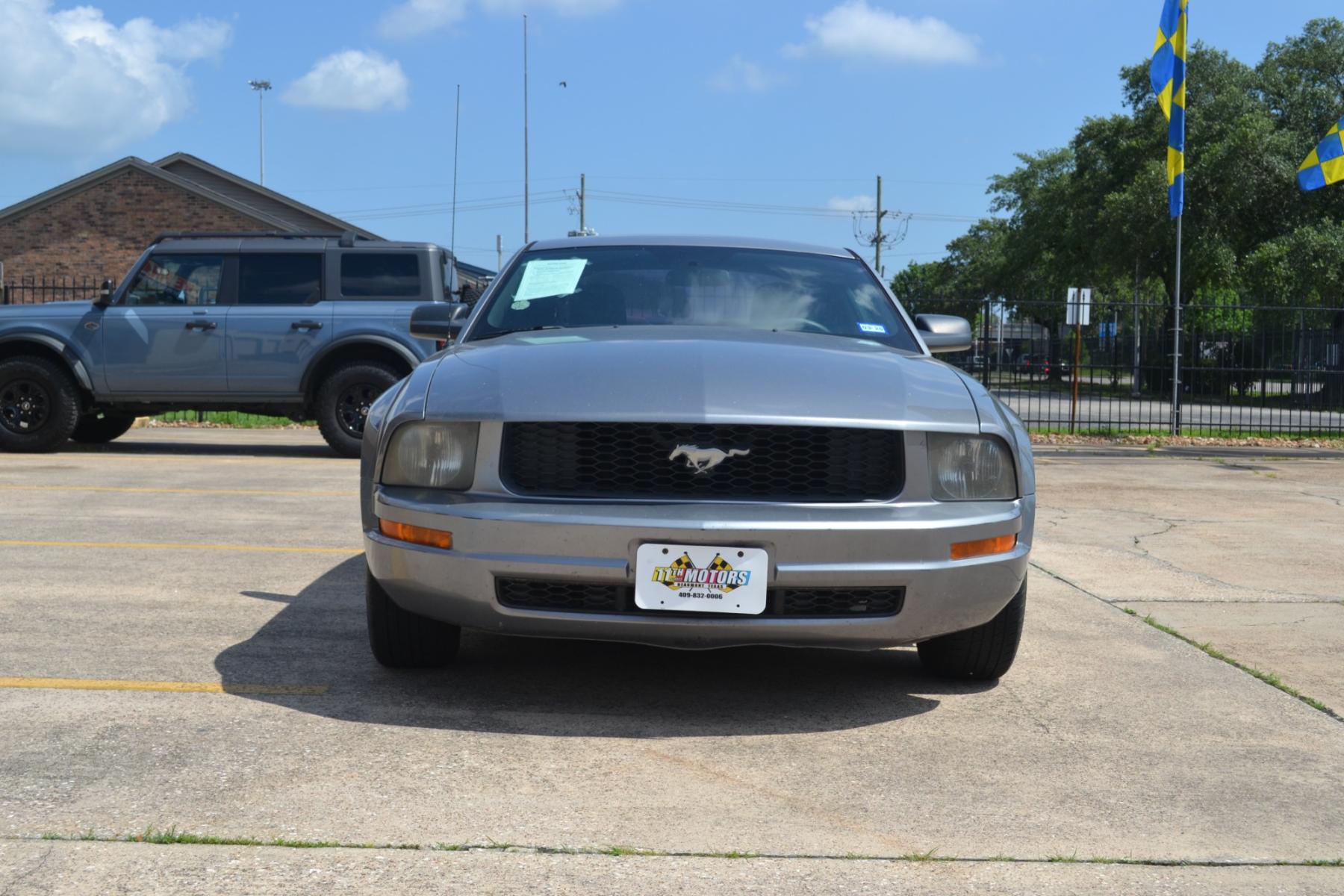 2006 Tungsten Grey Metall /Light Graphite Cloth Ford Mustang V6 Deluxe Coupe (1ZVFT80N665) with an 4.0L V6 SOHC 12V engine, located at 1355 North 11th Street, Beaumont, 77702, (409) 832-0006, 30.094290, -94.130096 - Photo #7
